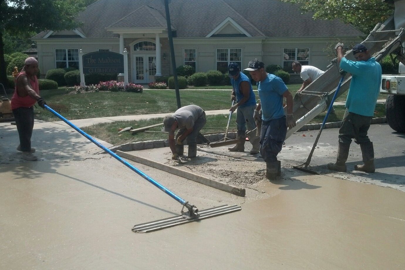 Pave Patrol concrete crew screeding a new slab in New Jersey