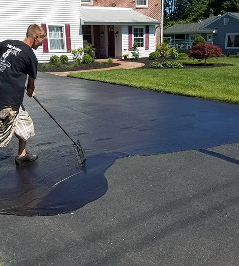 Squeegee-applied sealcoat on a Mercer County driveway